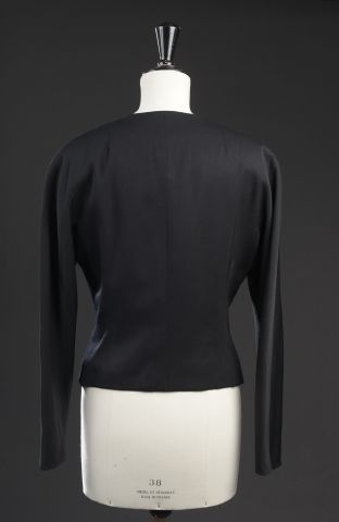 null Set of two jackets :

- one L'ECHO by DE LECOANET HEMANT, in black wool, fitted...