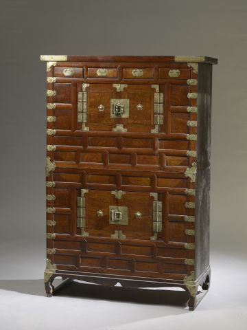 Cabinet in exotic wood veneer forming a chest...