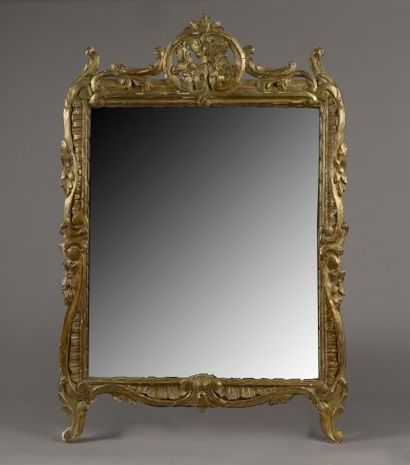 Wood and gilded stucco mirror. 

Louis XVI...