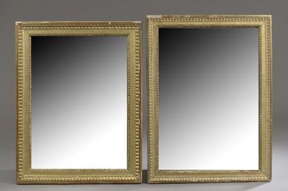 Two rectangular mirrors forming a pendant...