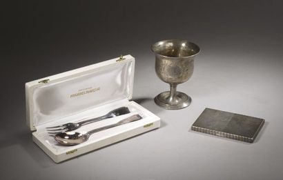 Silver set including : 

- a spoon and a...