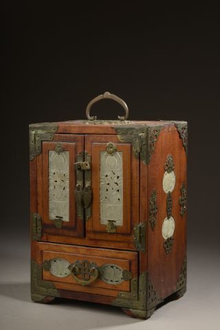null CHINA - Early 20th century.

Small wooden cabinet opening to two doors and a...