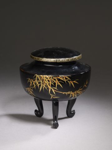null VIETNAM - 20th century.

Tripod incense burner covered with black lacquer, the...