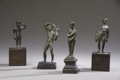 Four small bronze statuettes in the antique...