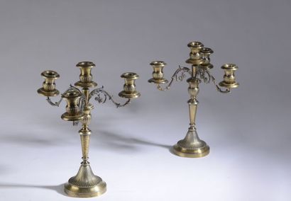 Pair of silver candelabras with three arms...