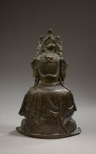 null CHINE - Dynastie MING (1368 - 1644).

Statuette de Guanyin en bronze à patine...
