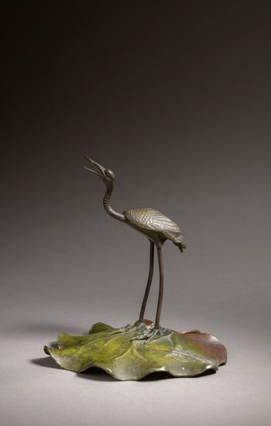 null CHINA - 20th century. 

Polychrome bronze subject representing a crane on a...