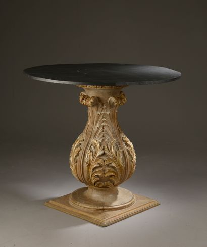 null Carved and gilded walnut baluster table base with large acanthus leaves on a...