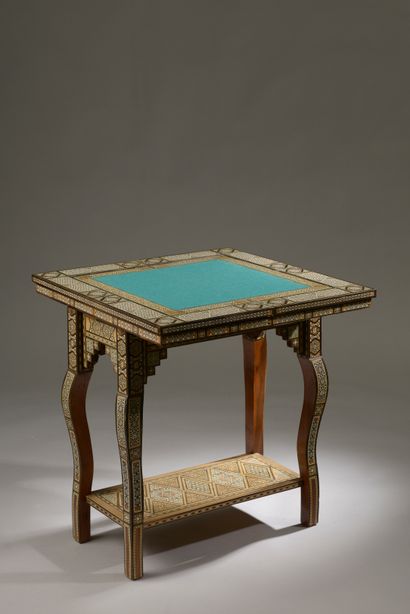 null Wooden game table decorated with bone marquetry and wood veneer of geometric...