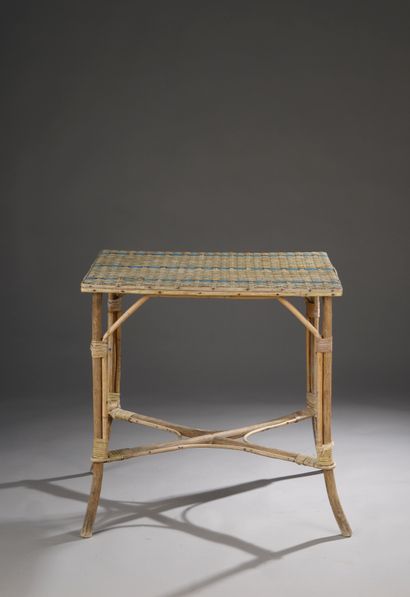 null Table in woven wicker and wood, the rectangular top (missing, insolate) standing...