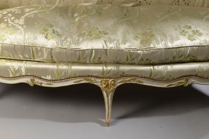 null Four beechwood armchairs, cream varnished and gold rechamped, with cabriolet...