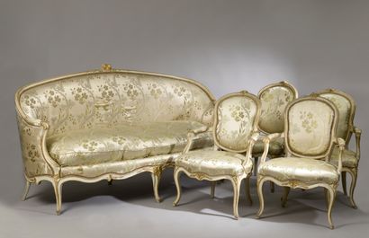 null Four beechwood armchairs, cream varnished and gold rechamped, with cabriolet...