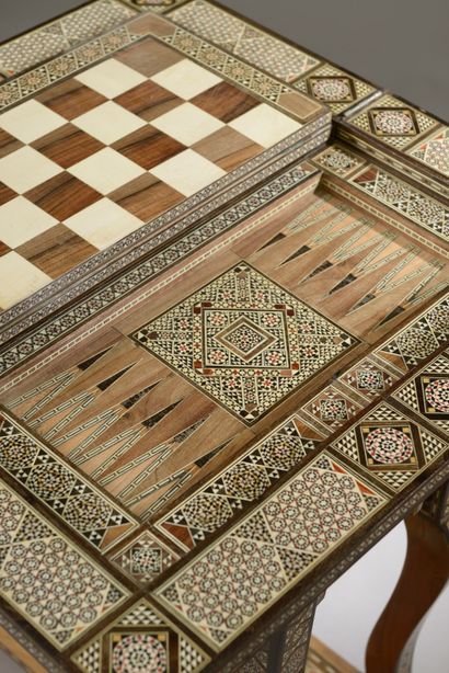 null Wooden game table decorated with bone marquetry and wood veneer of geometric...
