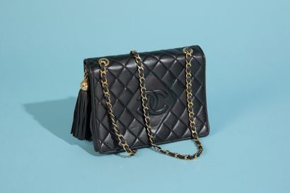 CHANEL. 
Bag in smooth black quilted lambskin,...