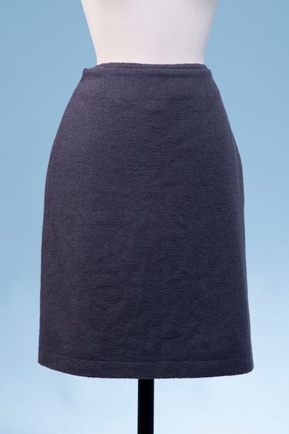 null CHANEL. 
Grey curly wool blend skirt, straight, knee length, slit at the front,...