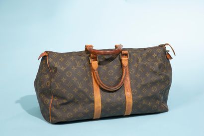 null LOUIS VUITTON.
Sac de voyage "Keepall" en toile enduite Monogram et cuir naturel...