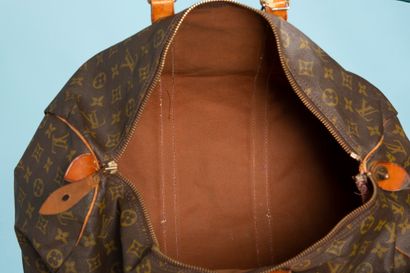 null LOUIS VUITTON.
Sac de voyage "Keepall" en toile enduite Monogram et cuir naturel...