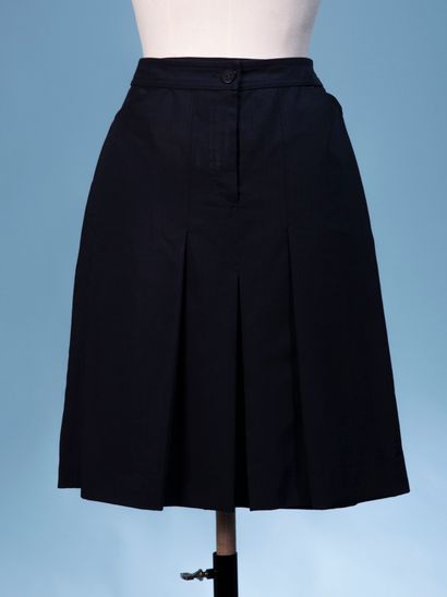 CHANEL. 

Navy blue wool blend skirt, knee...