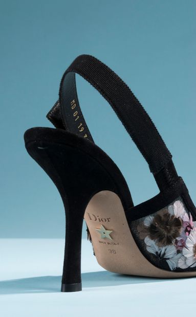 null CHRISTIAN DIOR. 
Pair of black leather and canvas slingback pumps embroidered...