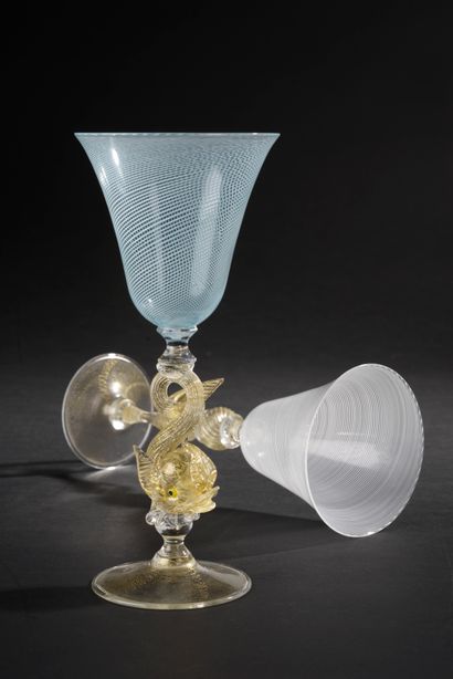 null MURANO.
Two glasses with foot out of blown and pinched glass, the cups widened...