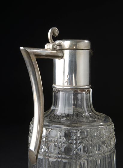 null FABERGE, Moscow. 
Crystal ewer cut with flutes between two braids with cane...