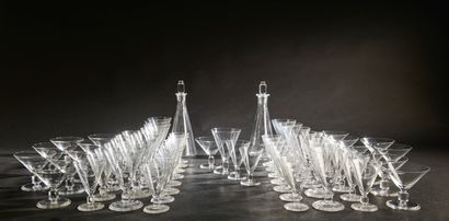 Crystal glass set in the shape of an inverted...