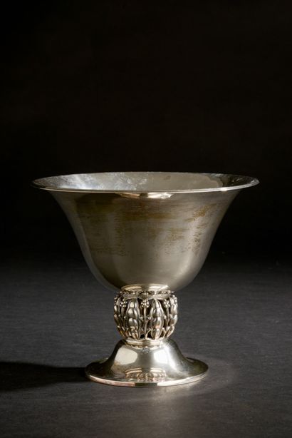 Hollow cup with flared neck out of silver...