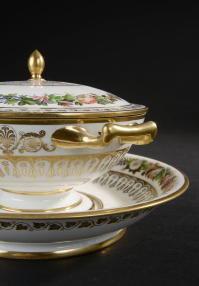 null PARIS.
Covered broth on pedestal and its display stand in white enamelled porcelain,...