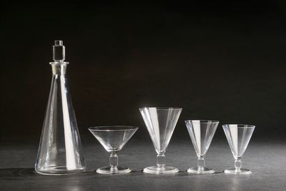 null Crystal glass set in the shape of an inverted cone on a cube, the circular base...