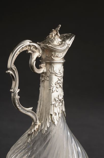 null Four ewers mounted in silver 950 thousandths (Minerve mark), the covered spout...