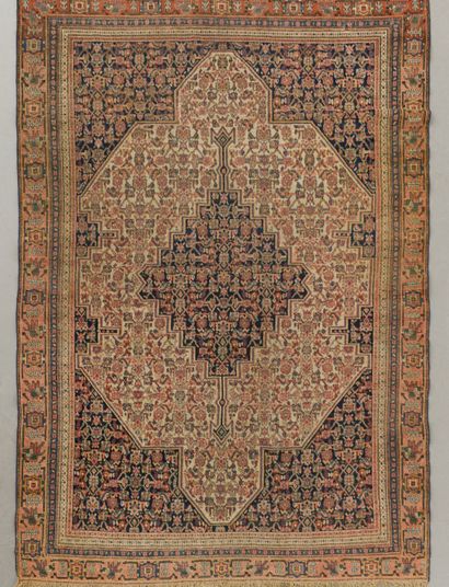 Rectangular polychrome wool carpet with rich...