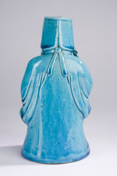 null CHINE - Vers 1900.
Statuette de Shoulao debout en porcelaine émaillée bleu turquoise...