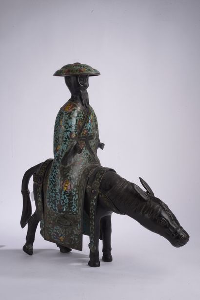 null CHINE - XXe siècle.
Statuette de Toba sur sa mule en bronze et émaux cloisonnés,...