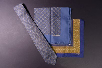 HERMÈS.
A tie and its matching silk pouch...