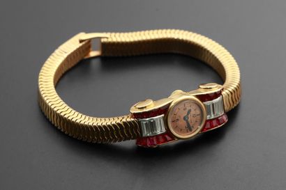 null CARTIER, n° 30668 n°8341.
Ladies' wristwatch in 18k rose gold with rubies and...