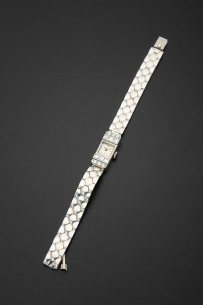 null EBEL.
Bracelet watch of lady in platinum 950 thousandths and diamonds, rectangular...