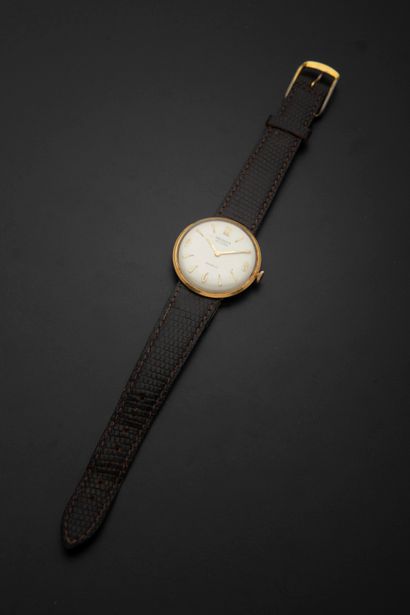 null REGLIA. 
Men's wristwatch in 18k yellow gold, the round case, the ivory dial...