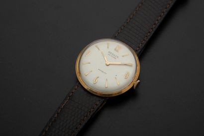 null REGLIA. 
Men's wristwatch in 18k yellow gold, the round case, the ivory dial...