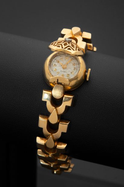 null Ladies' secret bracelet watch in 18k yellow gold, the round case with an openworked...