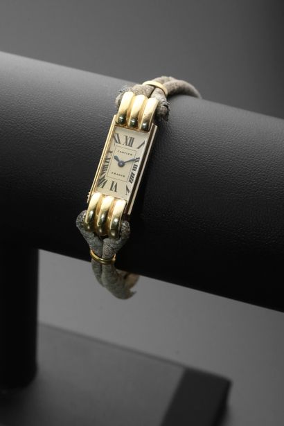 null CARTIER, No. 85411 and 19460.
Ladies' wristwatch in 18k yellow gold, rectangular...