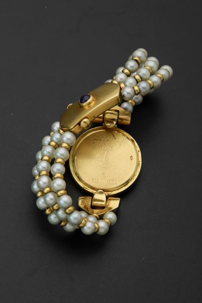 null LAUDIER "Changée".
Lady's bracelet watch in 18k yellow gold, the round case...
