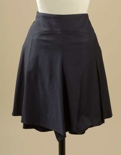 CHANEL. 
Black wool culotte skirt, flat waist,...