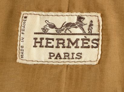 null HERMÈS. 
Perfecto jacket in tobacco lamb leather, three zipped pockets, gathered...