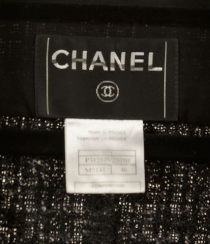 null CHANEL. 
Jacket in black and white mottled cotton tweed, straight, notched collar,...