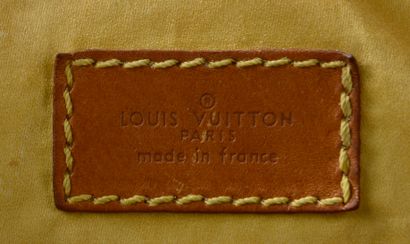 null LOUIS VUITTON. 
Sac de voyage en toile enduite Monogram et cuir naturel, semi-rigide,...