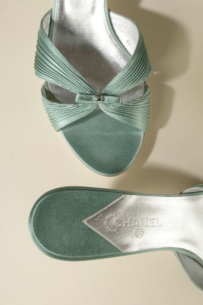 null CHANEL. 
Pair of celadon satin sandals with draped open toe and stiletto heel....