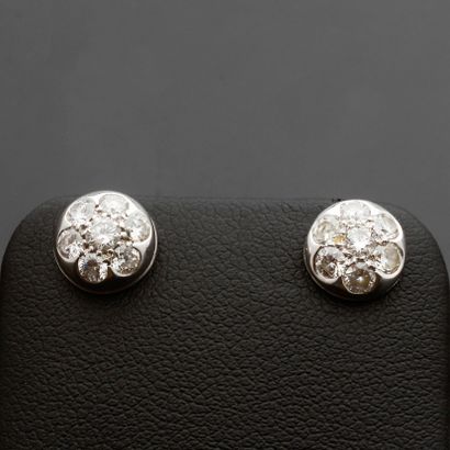 Pair of earrings in 18k white gold, decorated...