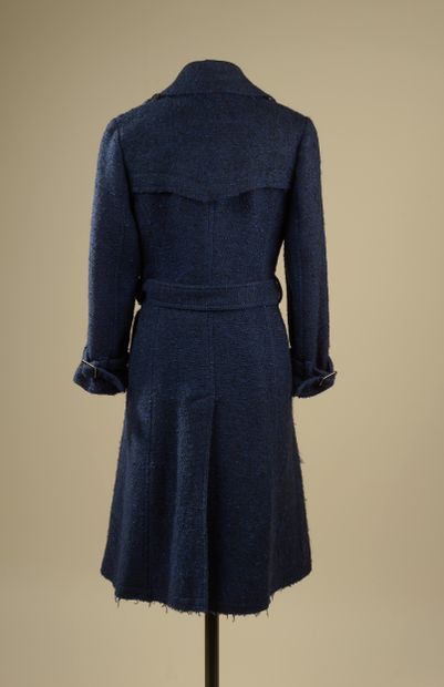 null BURBERRY. 
Manteau en laine dans les tons de bleu et noir, le col cranté, deux...