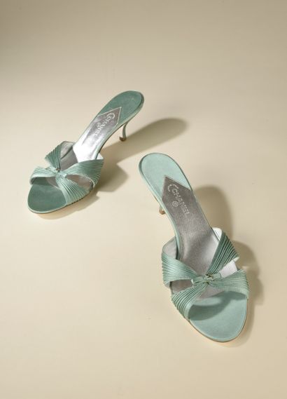 CHANEL. 
Pair of celadon satin sandals with...