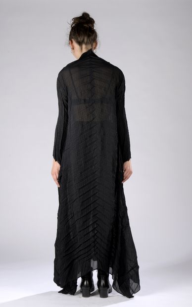 null ISSEY MIYAKE.
Evening dress in black polyester pleated with herringbone pattern,...